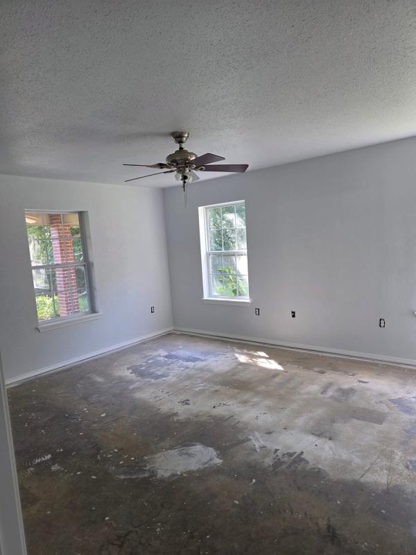 Living room repainted and prepped for new floors